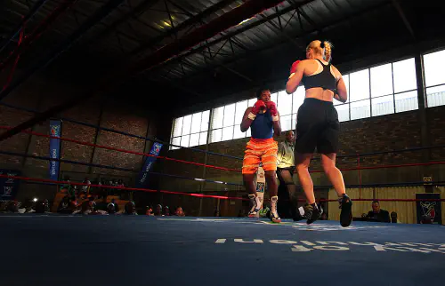 Women fighting in a boxing tournament in Brakpan