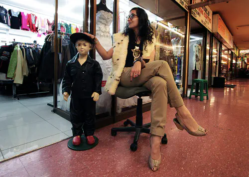 Anita with a funny mannequin at the Oriental Plaza