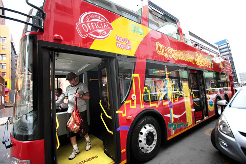 Heather's dad riding the Red Bus