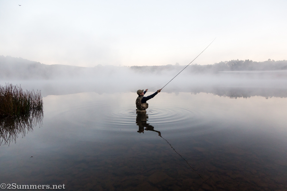 Man flyfishing in Stanford Lake