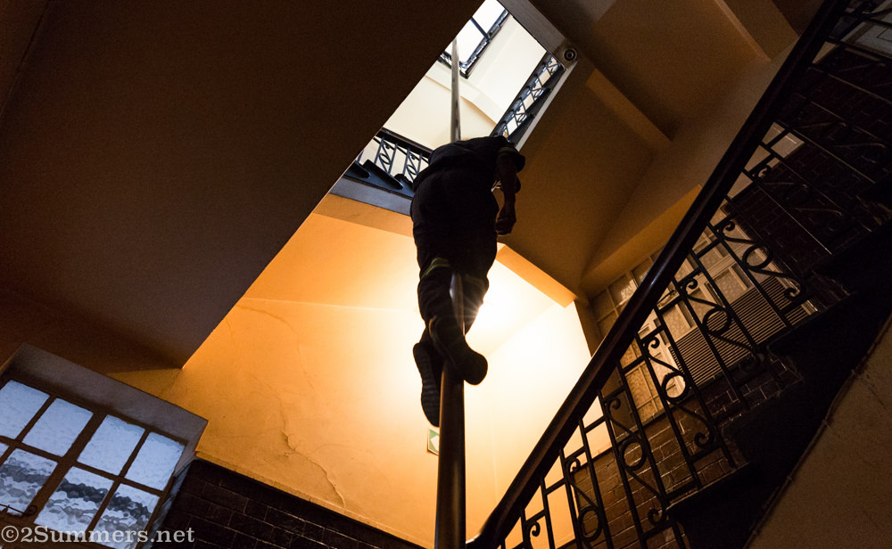 Fireman slides down the pole at Central Fire Station