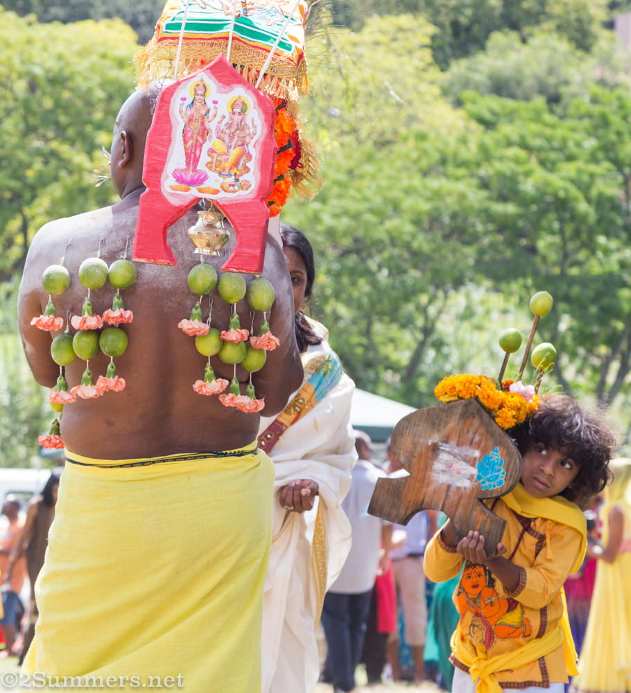 Young child carrying Kavady