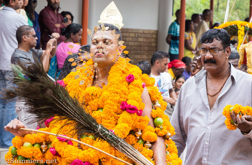 Guy with tons of flowers
