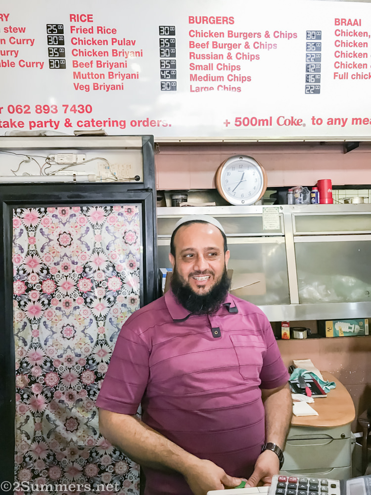 Man behind the counter at Food Junxion