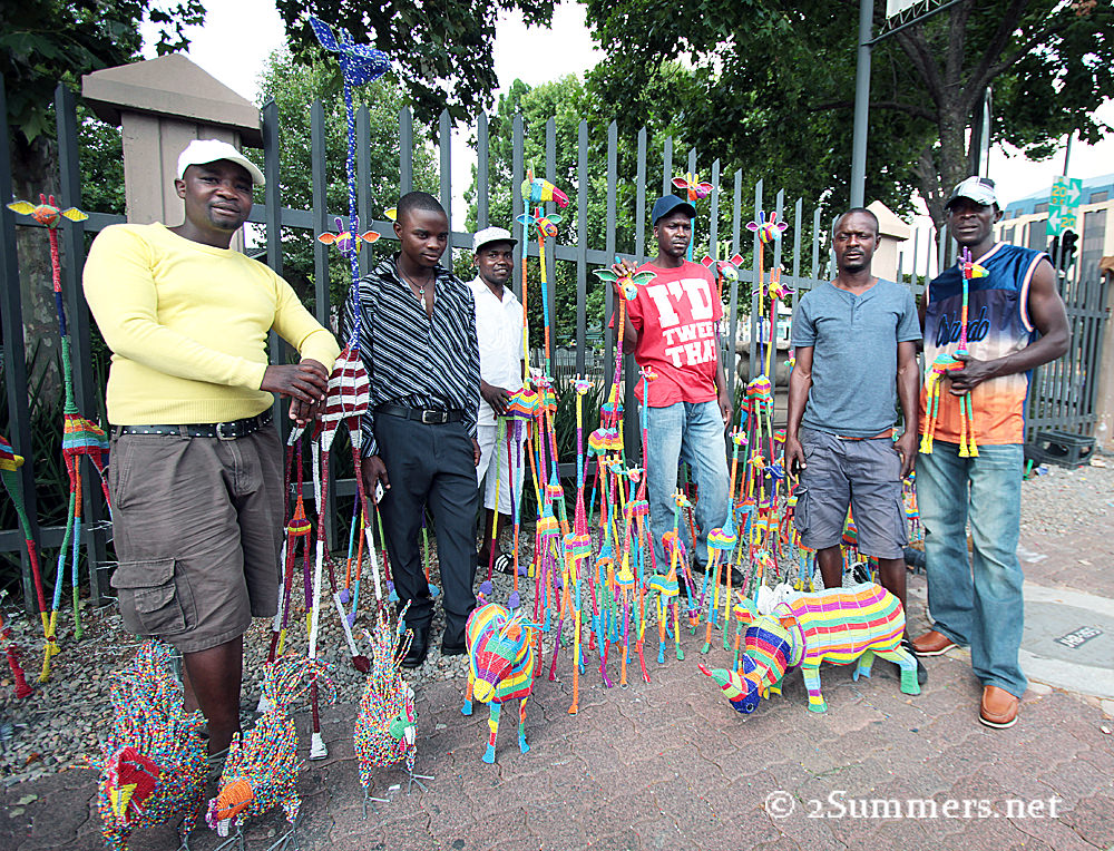 Rainbow giraffe artists