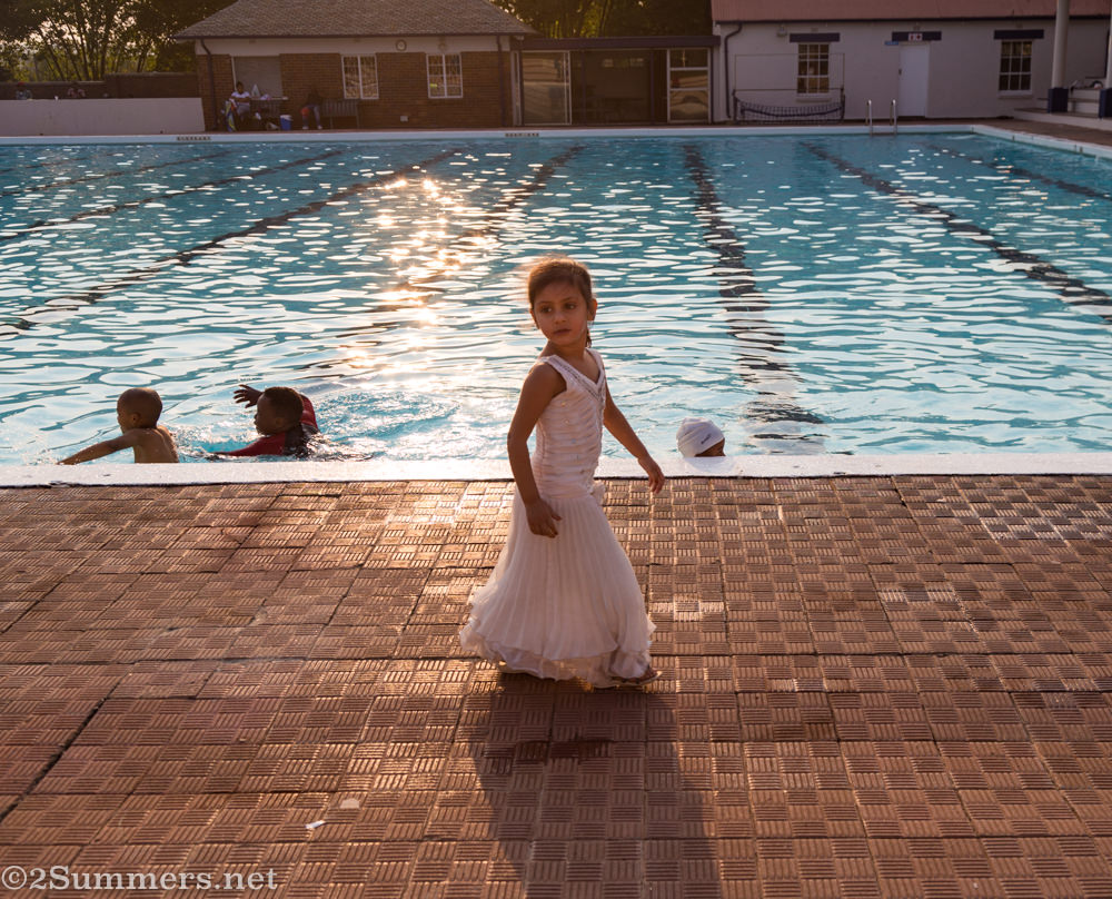 Little girl in a face dress at Zoo Lake Swimming Pool