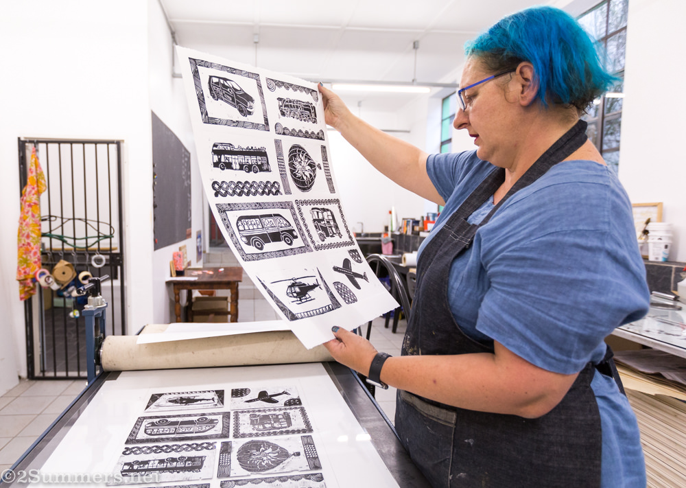 Fiver looks at the prints.