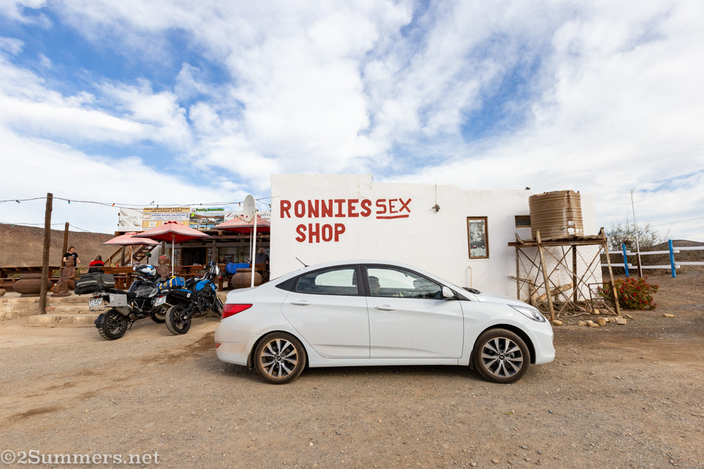 Car in front of Ronnie’s Sex Shop
