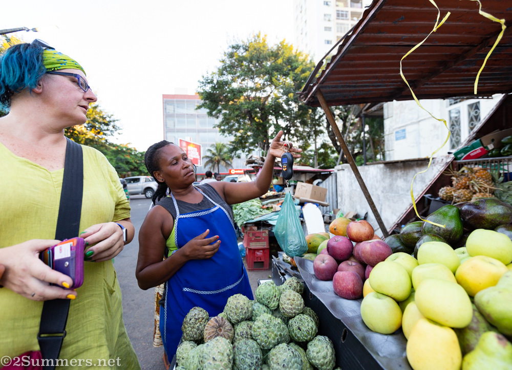 Buying custard apples on the street in Maputo.