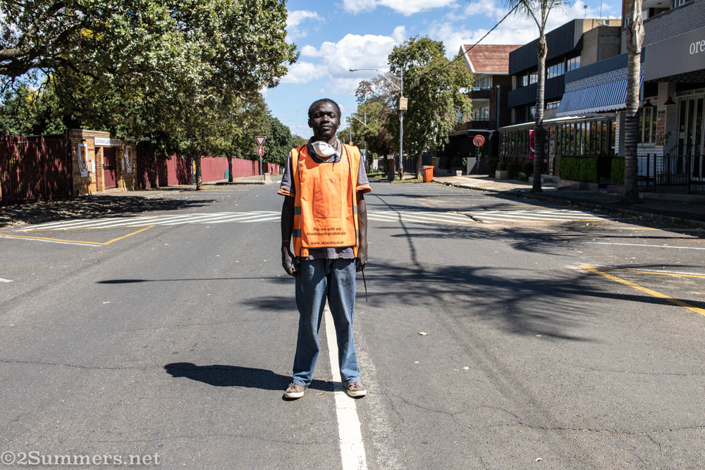 Fan Fan, a car guard outside the Cheese Gourmet in Linden.