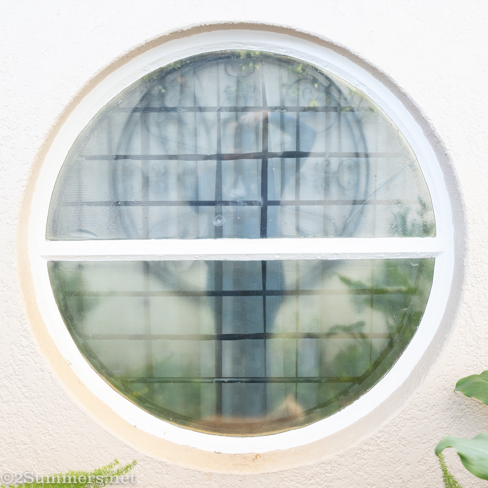 Round bathroom window selfie