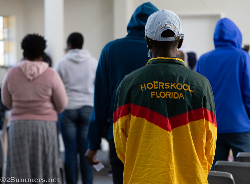 People waiting for food parcels