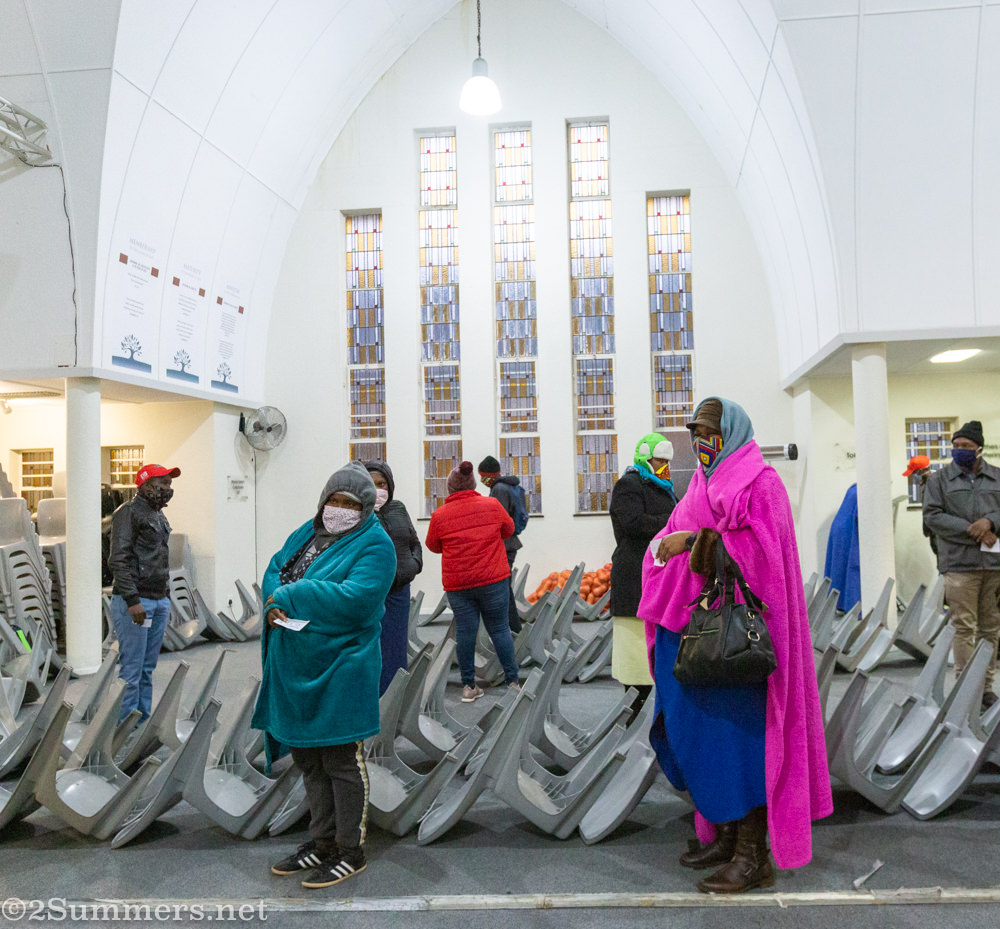 People inside the church to collect parcels