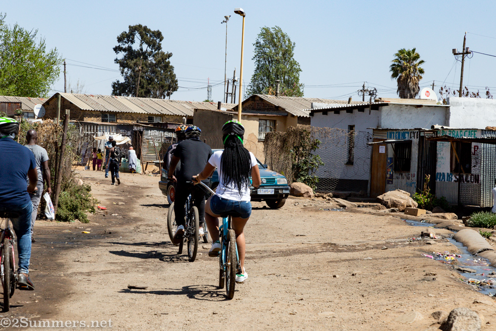 Riding through Mzimhlophe men’s hostel