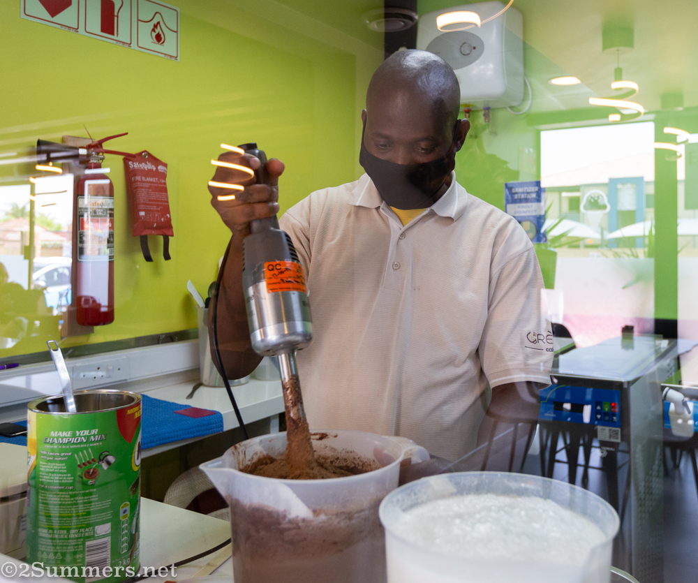 Guy making gelato at Creme Cafe