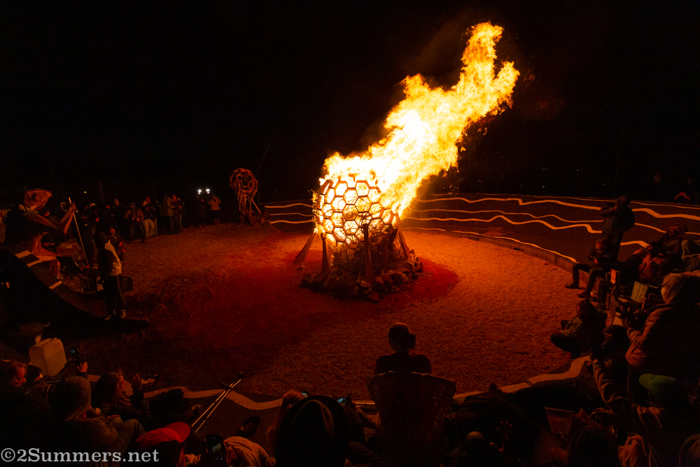 Spectators gathered around the fire at the Brixton Burn