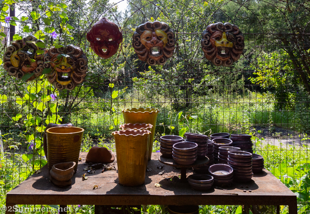 Pots and lion faces