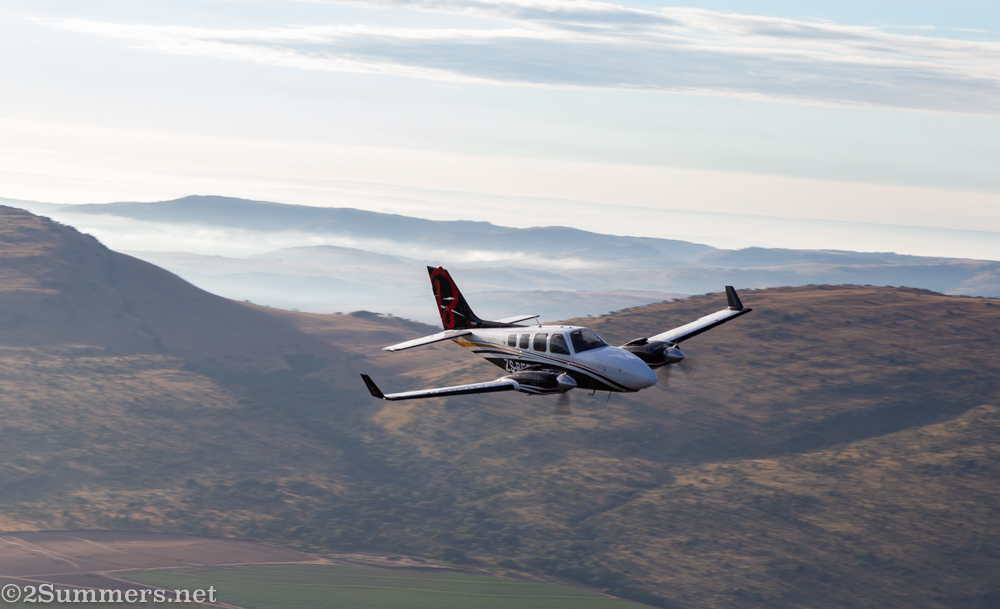 Airplane flying past the balloon
