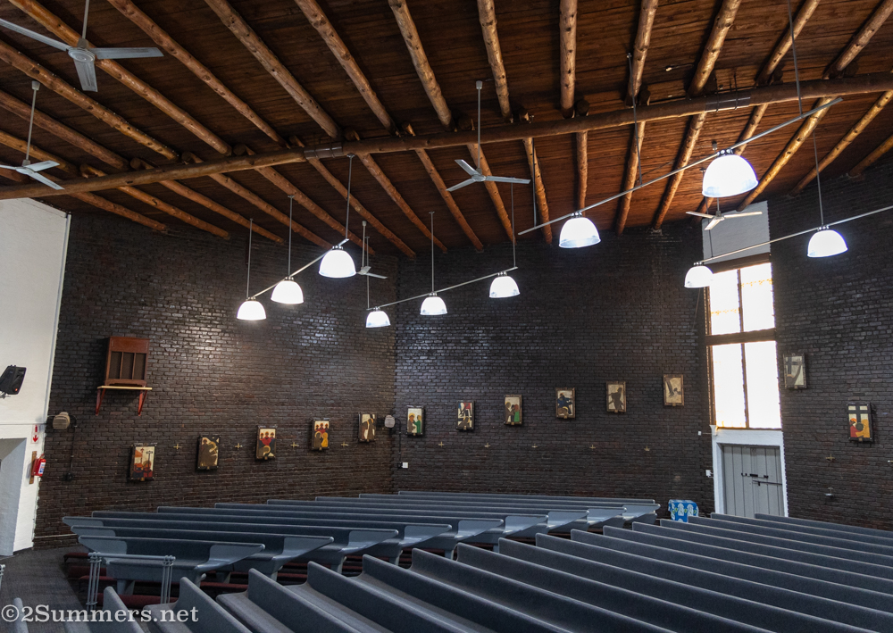 Inside the nave of St. Jospeh the Worker. Note the gum poles in the ceiling, which seem to be a regular feature of Turgel-designed churches.
