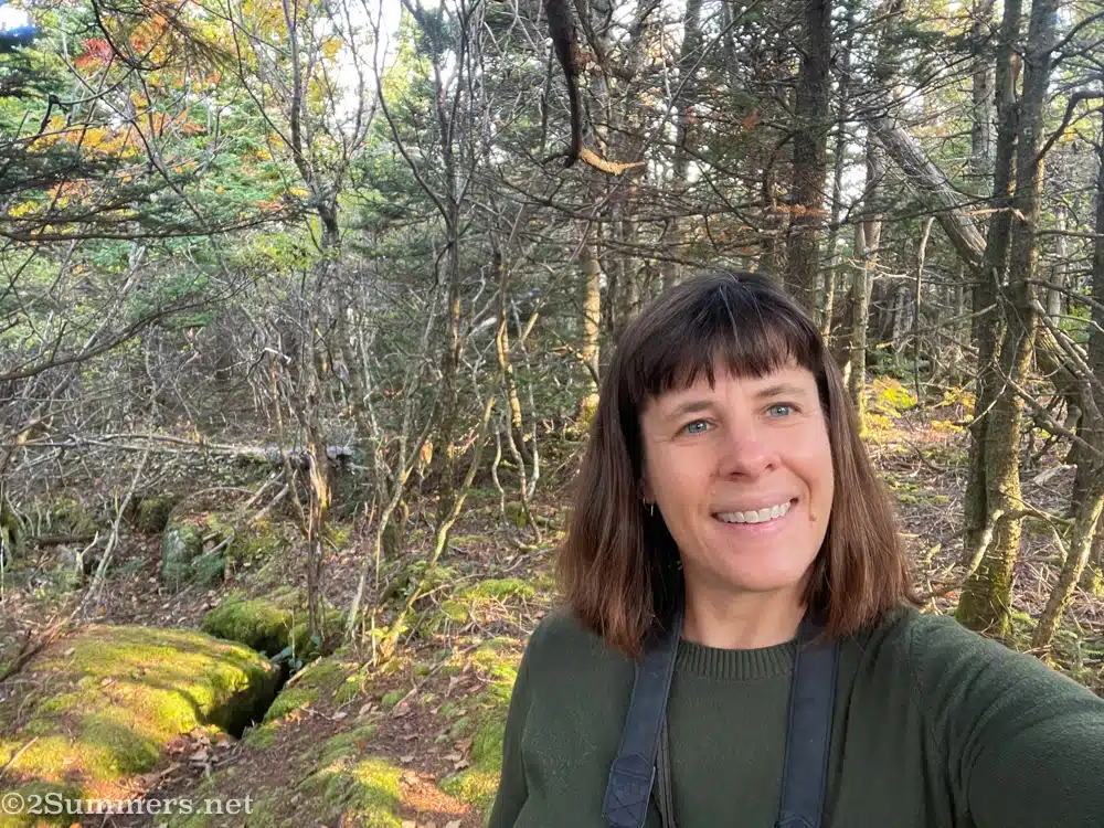 Heather in the woods on Cadillac Mountain.