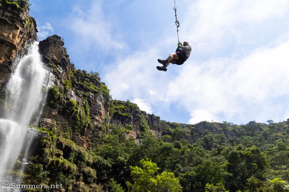 Guy swinging over the Graskop Gorge