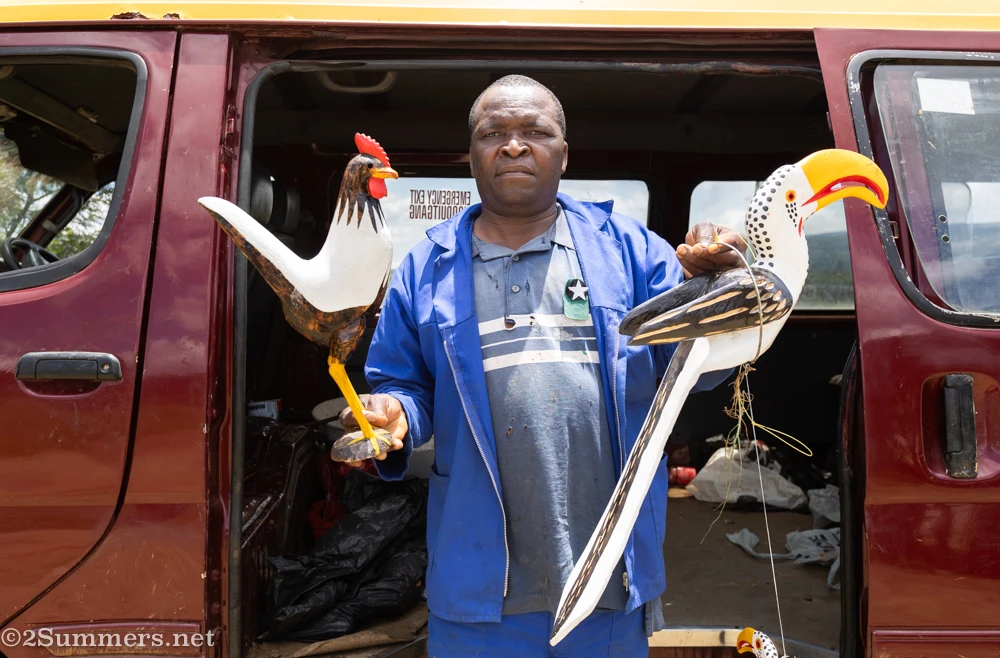Peter the bird carver holding our chicken