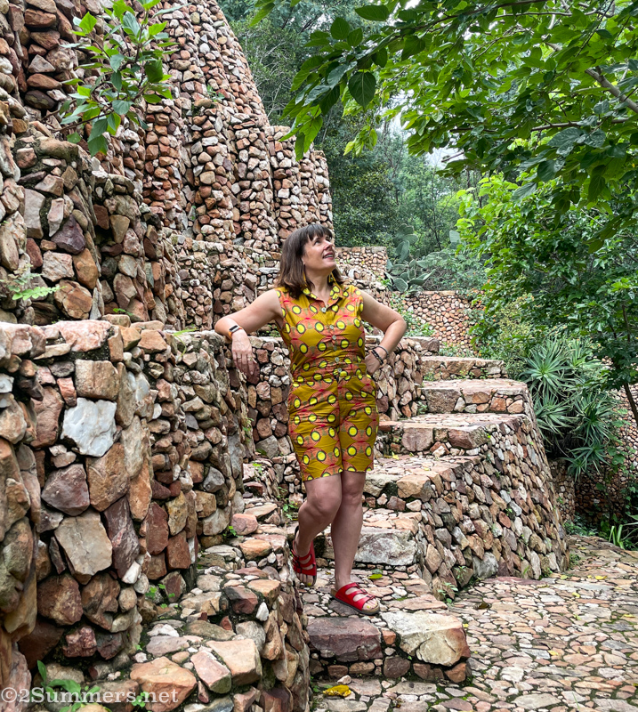 Heather standing in a garden.