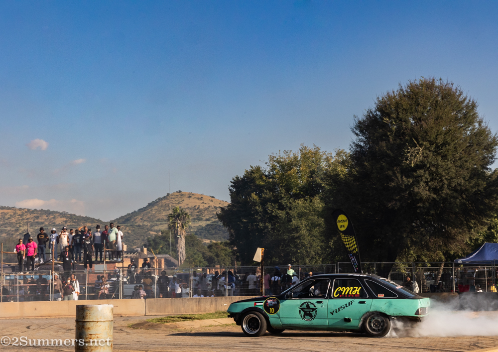 Yusuf driving his green Ford