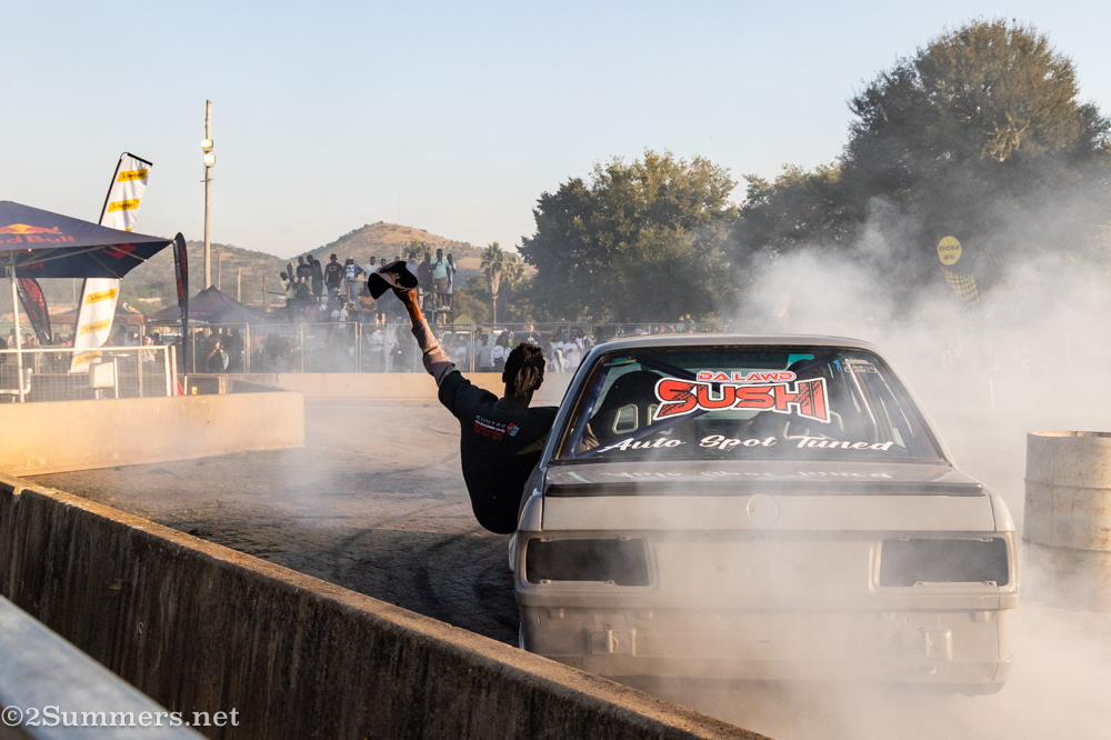 Guy leaning out of car