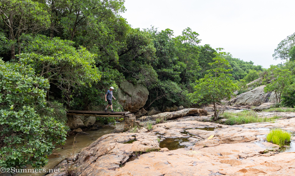 Walking around the base of the waterfall.