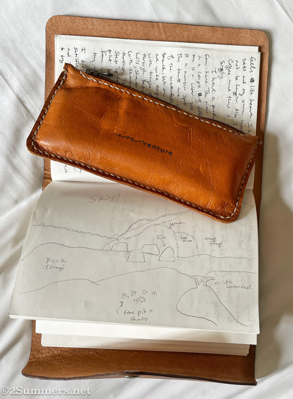Heather’s journal and pencil case with a sketch of the Inventure camp
