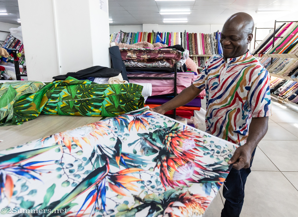Salesman displaying fabric