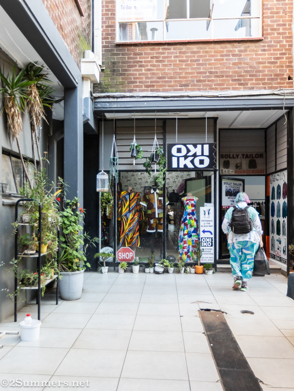 Five walking into the tailor