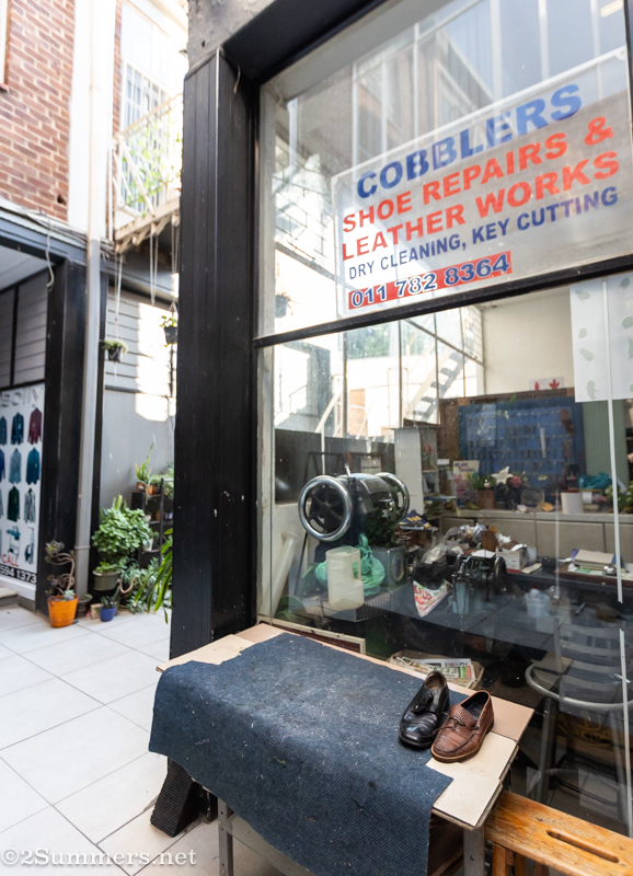 The combined cobbler/key-cutter.