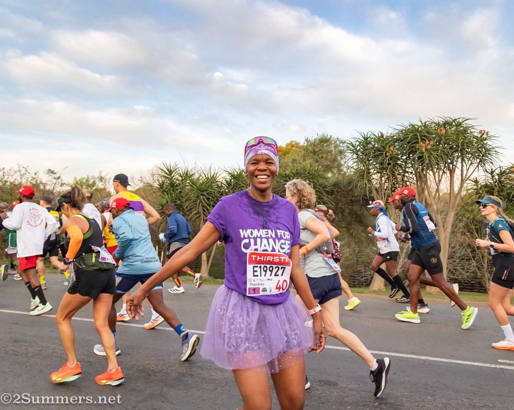 Lady running in purple tutu