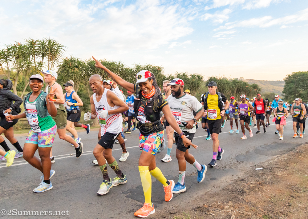 Happy lady running the Comrades Marathon