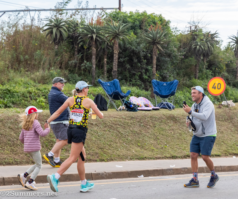 Family supporting a runner at Comrades Marathon