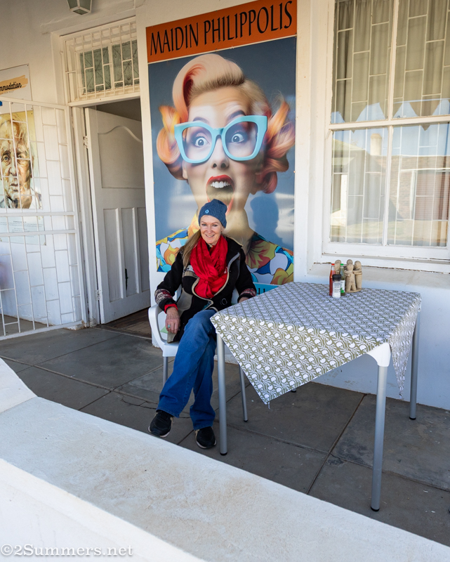 Mercedes on the stoep of her restaurant at the van der Post Memorial Centre