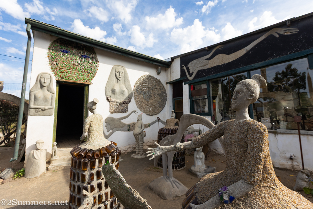 Entrance to the Lion’s Den and garden sculptures