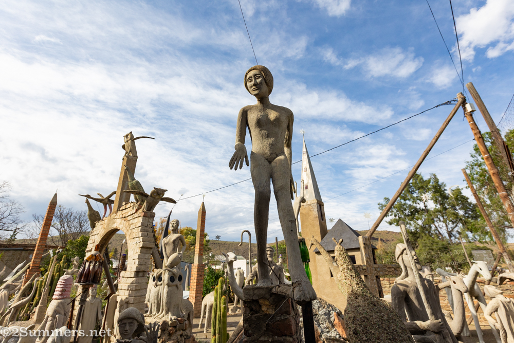 An army of crazy concrete figures at the Owl House.