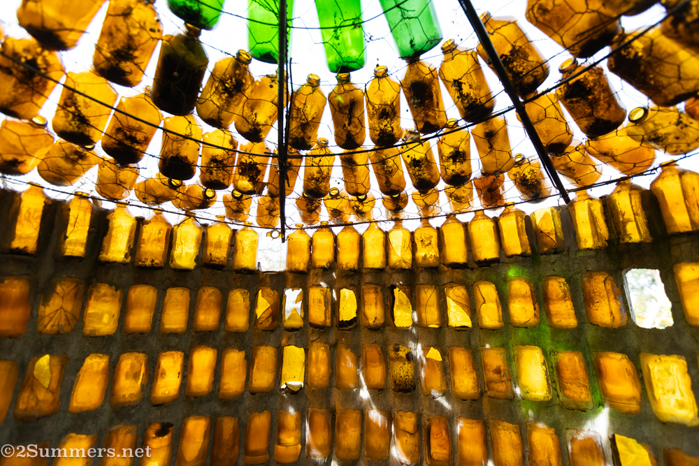 Golden glass building in Owl House garden